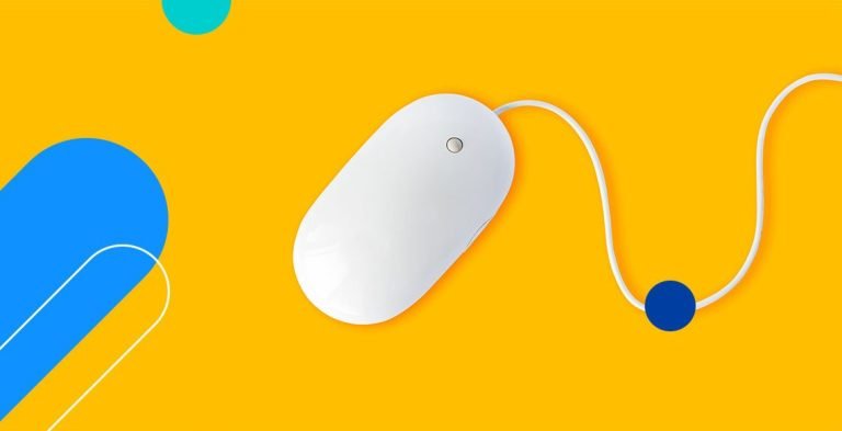 Mouse de computador sobre fundo amarelo